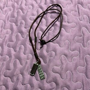 Brown Leather Necklace with Silver Pendant Strength and bravery